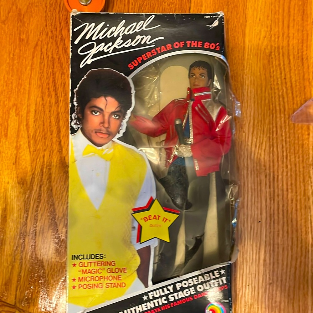 Authentic Michael Jackson 1984 Beat it outfit poseable doll with stand.